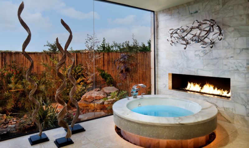 Stunning bathroom showcases the perfect way to use a Jacuzzi indoors!