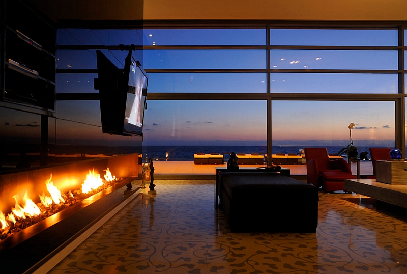 Stunning living room with the wall-mounted television above the fireplace