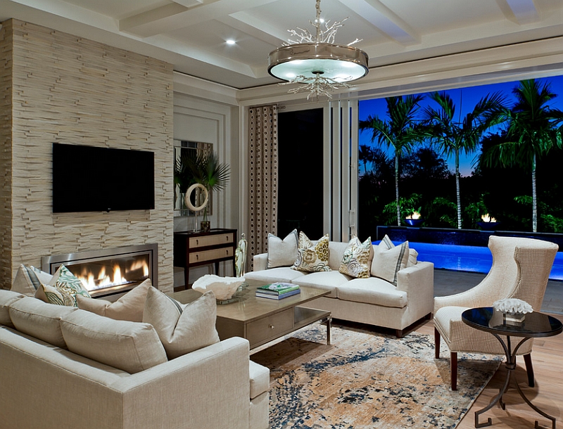 The wall holding the fireplace and TV adds textural contrast to the room