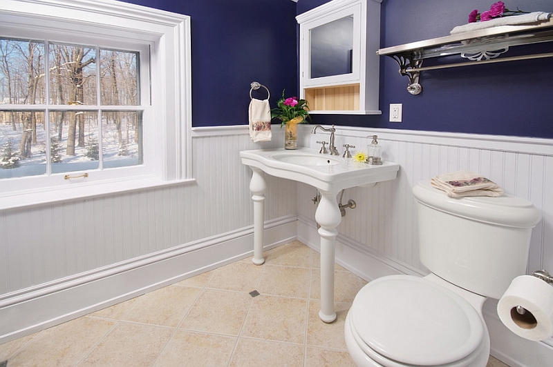 Traditional bathroom looks super cool in bold blue and glossy white