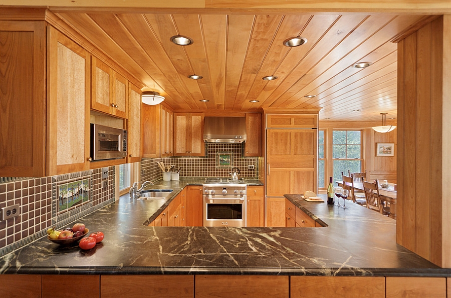 Traditional kitchen with wooden cabinets and cool tile backsplash