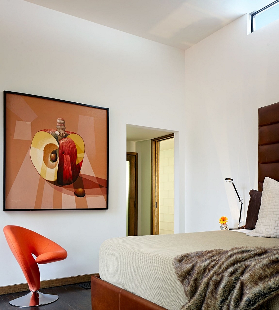 Tranquil bedroom in white with hints of orange