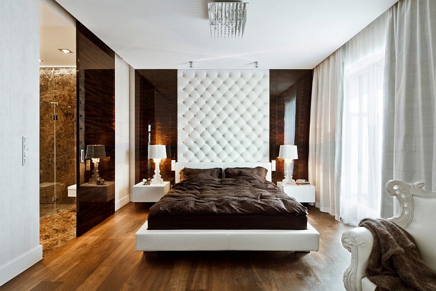 Tufted headboard that extends all the way to the ceiling