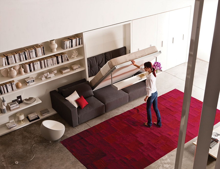 bed with chairs and shelves