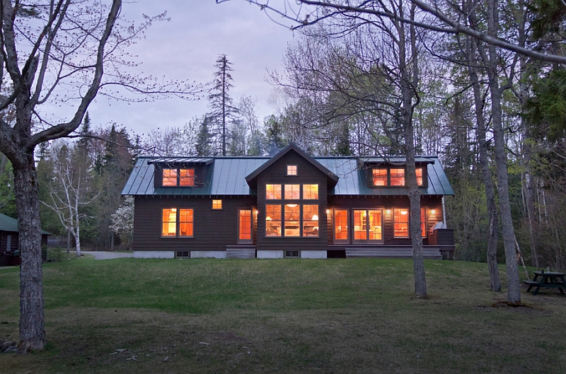 View of the lakeside elevation of the house at dusk