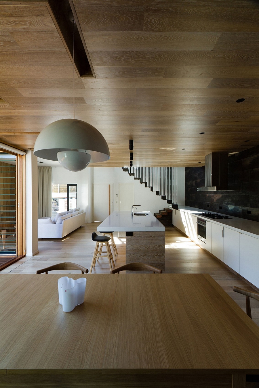 View of the open floor living area from the dining room