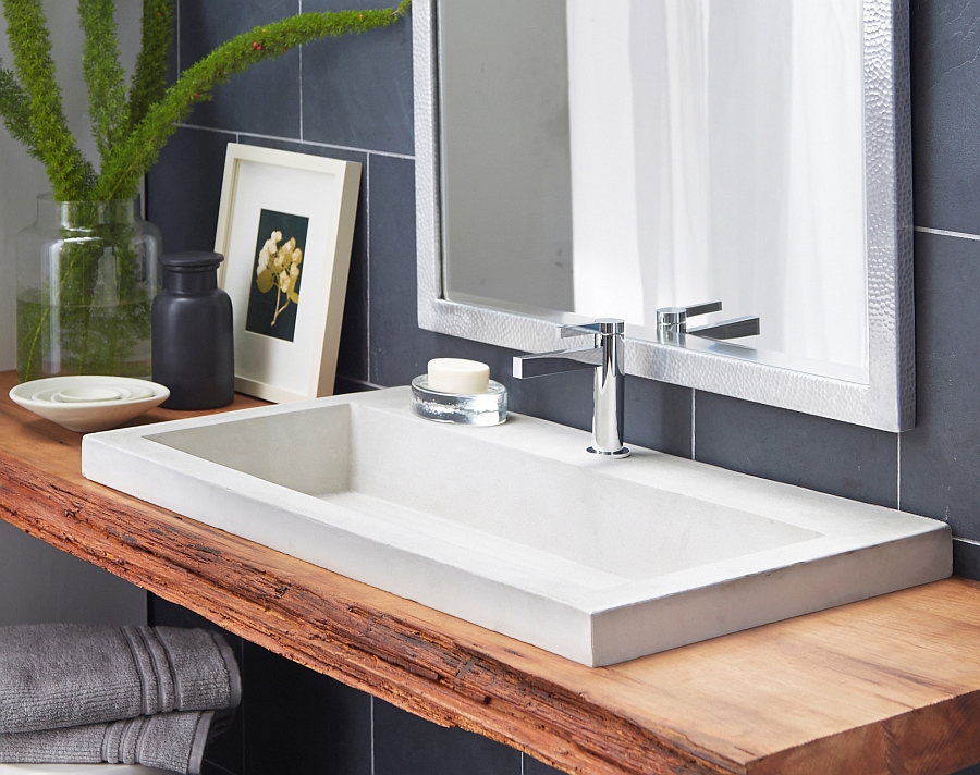 White bathroom sink on a floating wooden vanity