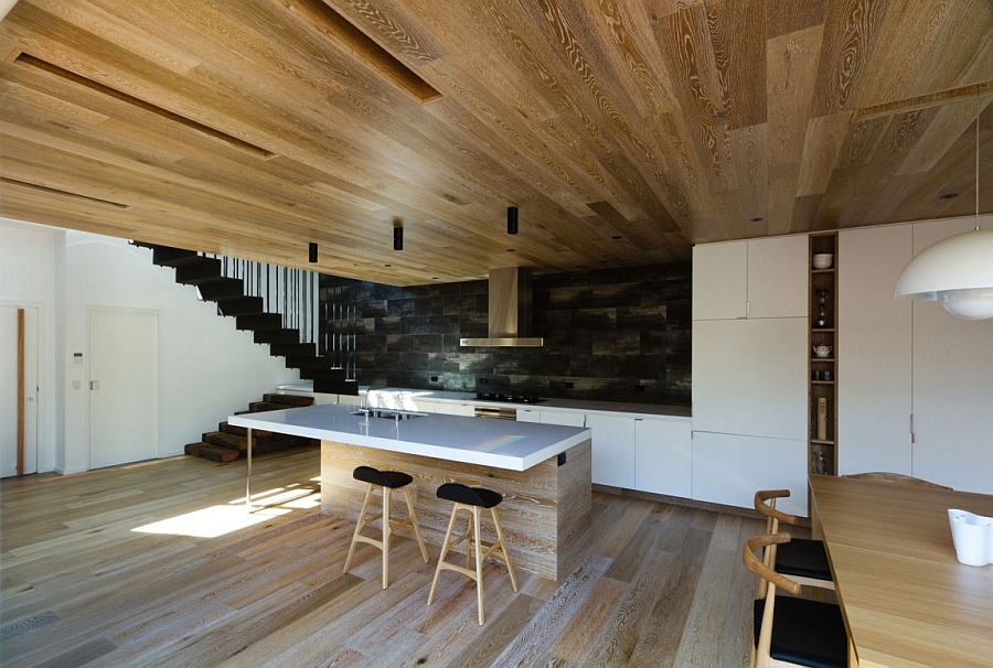 Wooden ceiling and floor give the home a distinct identity