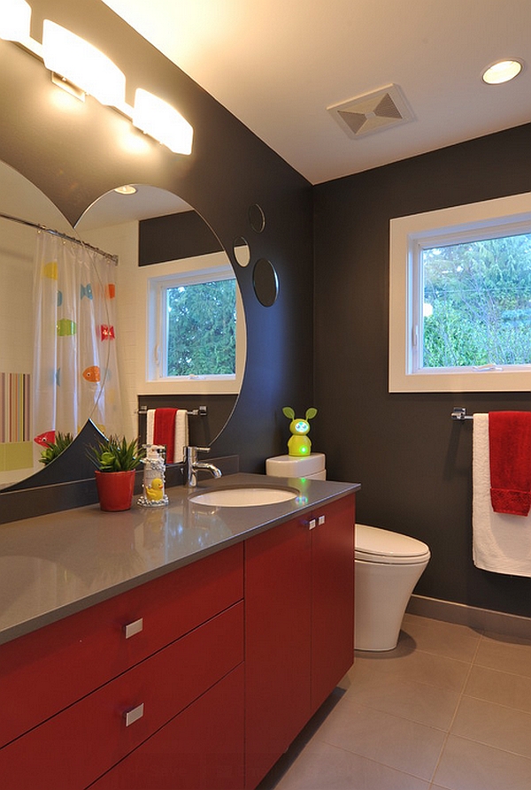 A black backdrop lends sophistication to the bathroom