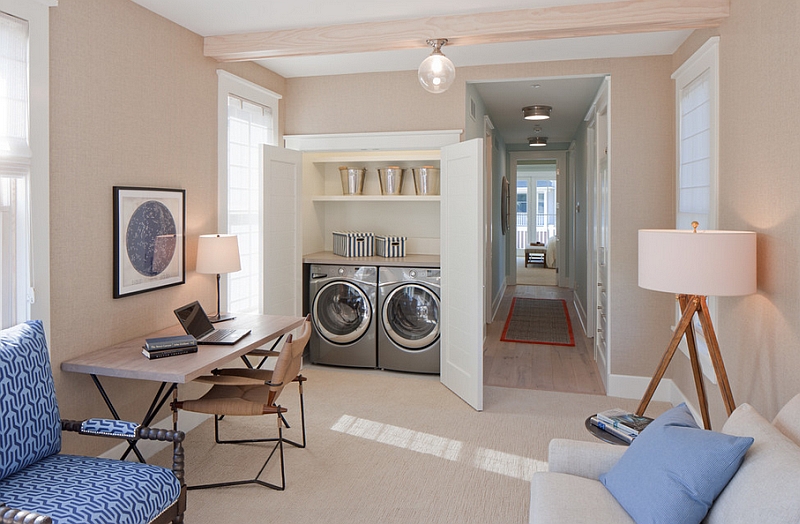 Beach style laundry and home workspace with a compact tripod lamp