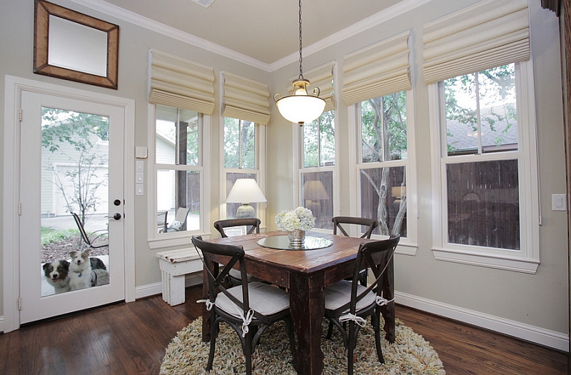 Beautiful breakfast room is visually connected with the outdoors