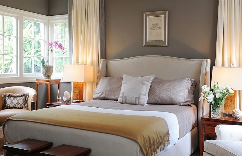 Bedroom with gray walls and drapes in cream truly looks stunning!