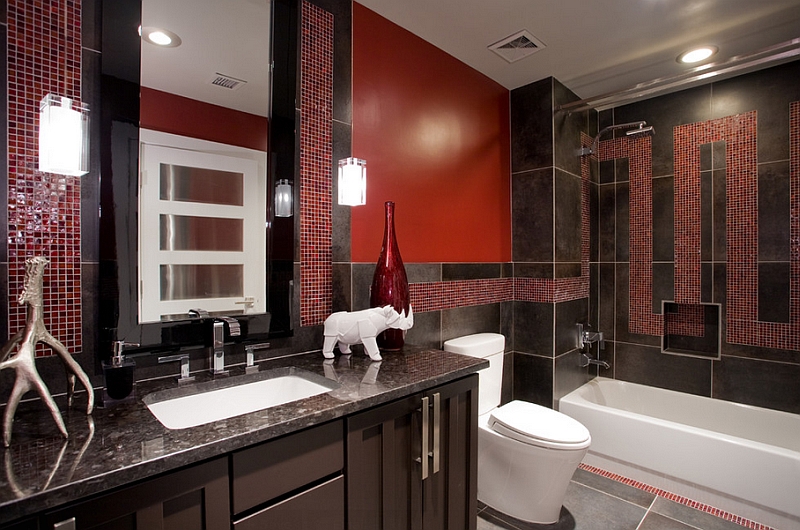 Black granite countertop and Italian porcelain tiles enliven this bathroom