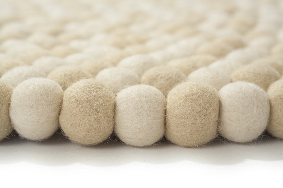 Closer Look at the plush Double White Detail Felt Ball Rug