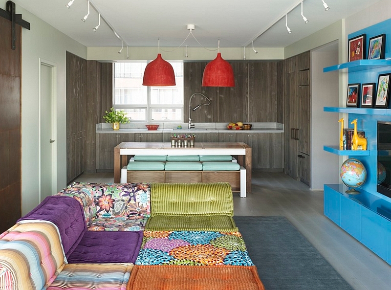 Colorful family room with a cool Bohemian style welcomes you with plush seating!