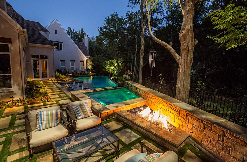 Complete the poolside lounge with a trendy fireplace