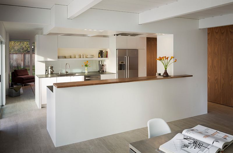 Connect the kitchen with the dining space with a half wall