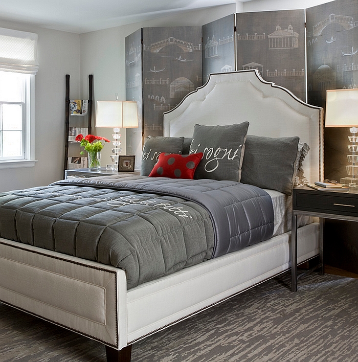 Custom hand-painted screen and multiple shades of grey shape this exceptional bedroom