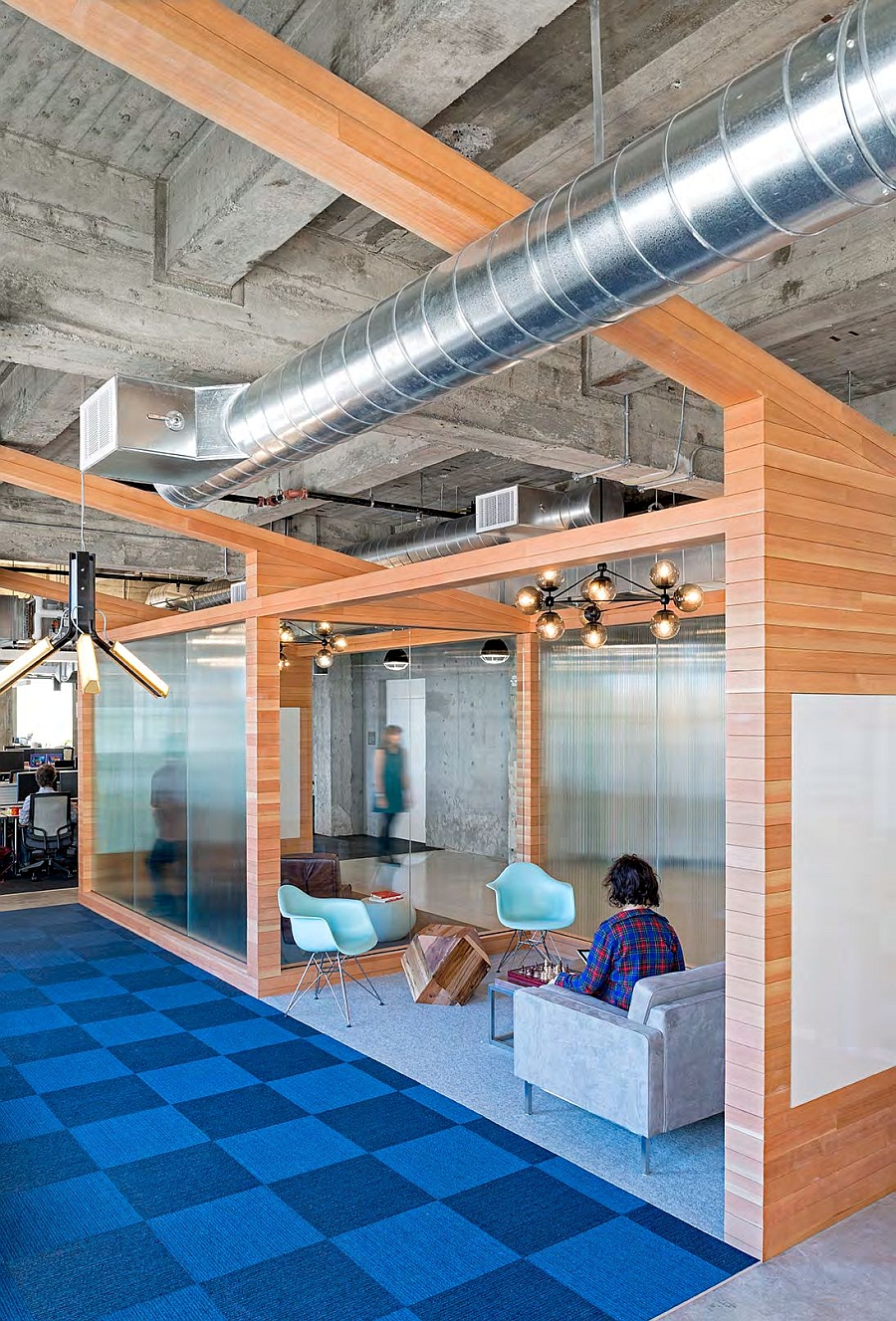 Eames molded plastic chair in blue inside the Yelp headquarters