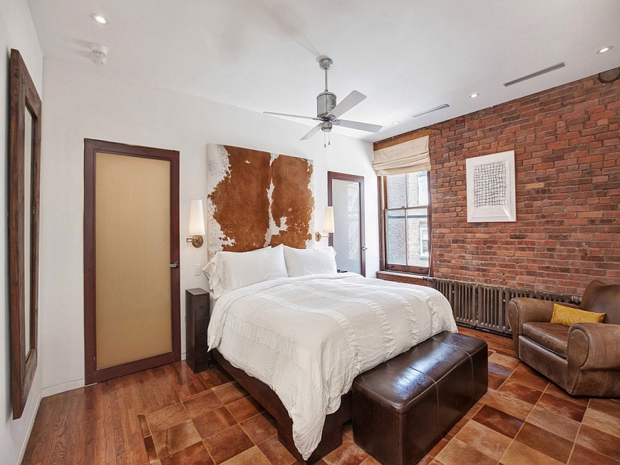 Elegant bedroom in New York city apartment with a rustic style