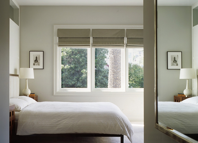 Enhance the color scheme of the room with the right roman shades