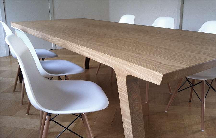 Exclusive dining table in wood seems like it is crafted from a single log
