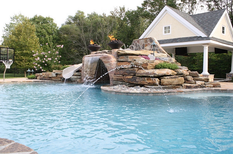 Expansive pool with a water slide, waterfall feature and water jets!