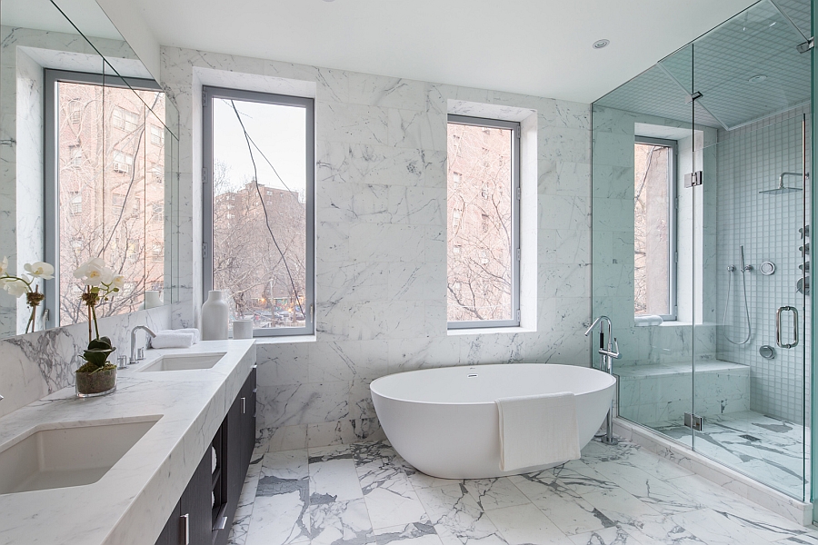 Exquisite contemporary bathroom in marble with a freestanding tub