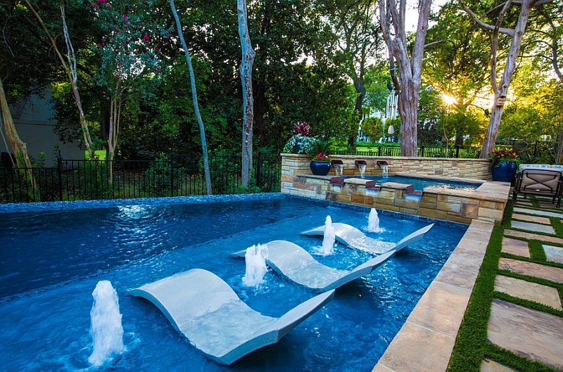 Exquisite pool area with lovely little fountains and water loungers