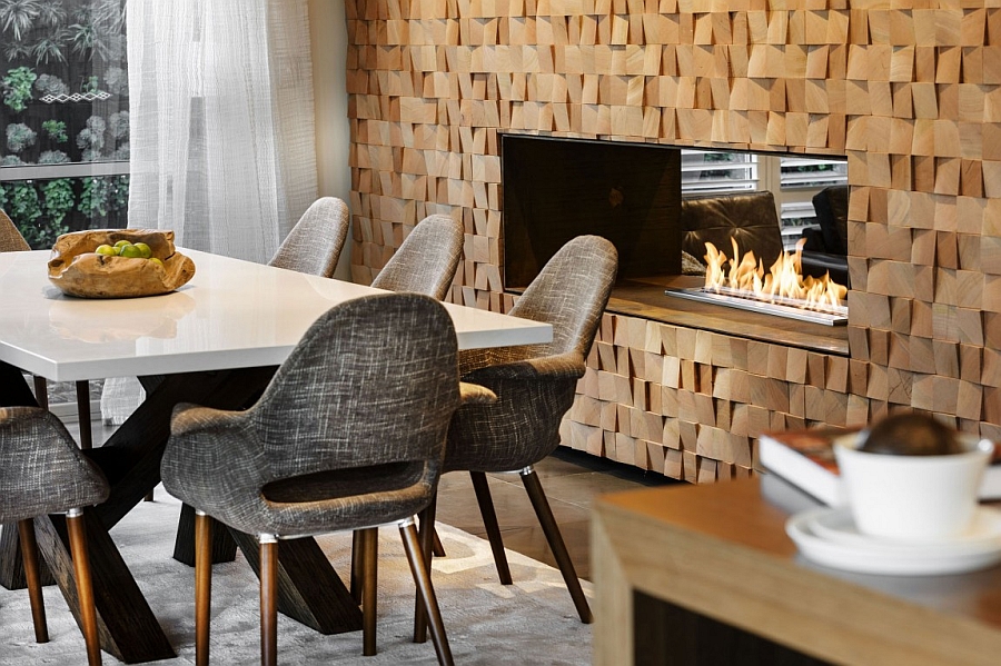 Exquisite textured wall steals the show in this dining room