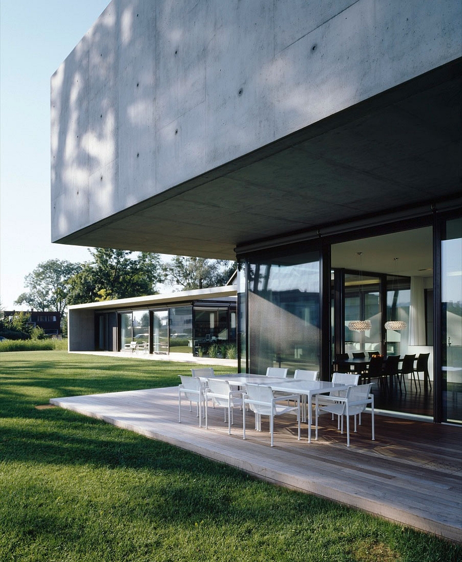 Exterior is a blend of raw concrete, wood and glass