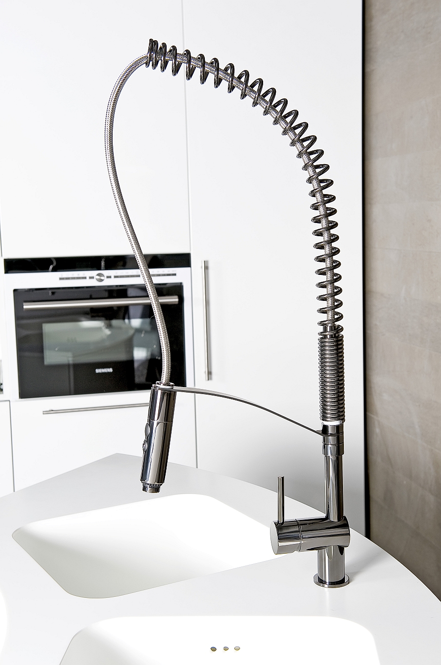 Fabulous kitchen faucet is available in three different finishes