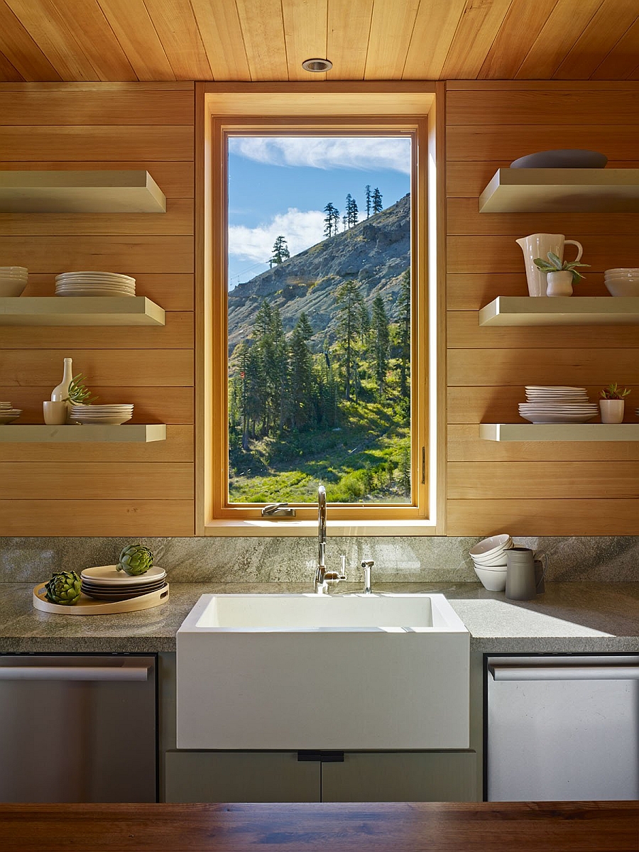 Framed views of the mountain slope outside from the elegant kitchen