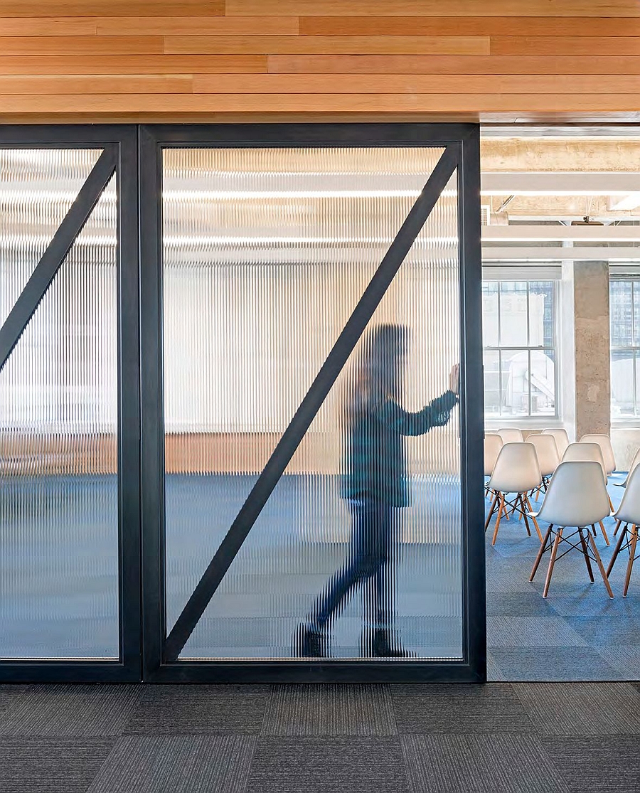 Frosted sliding glass doors give ample privacy even while letting in ventilaton