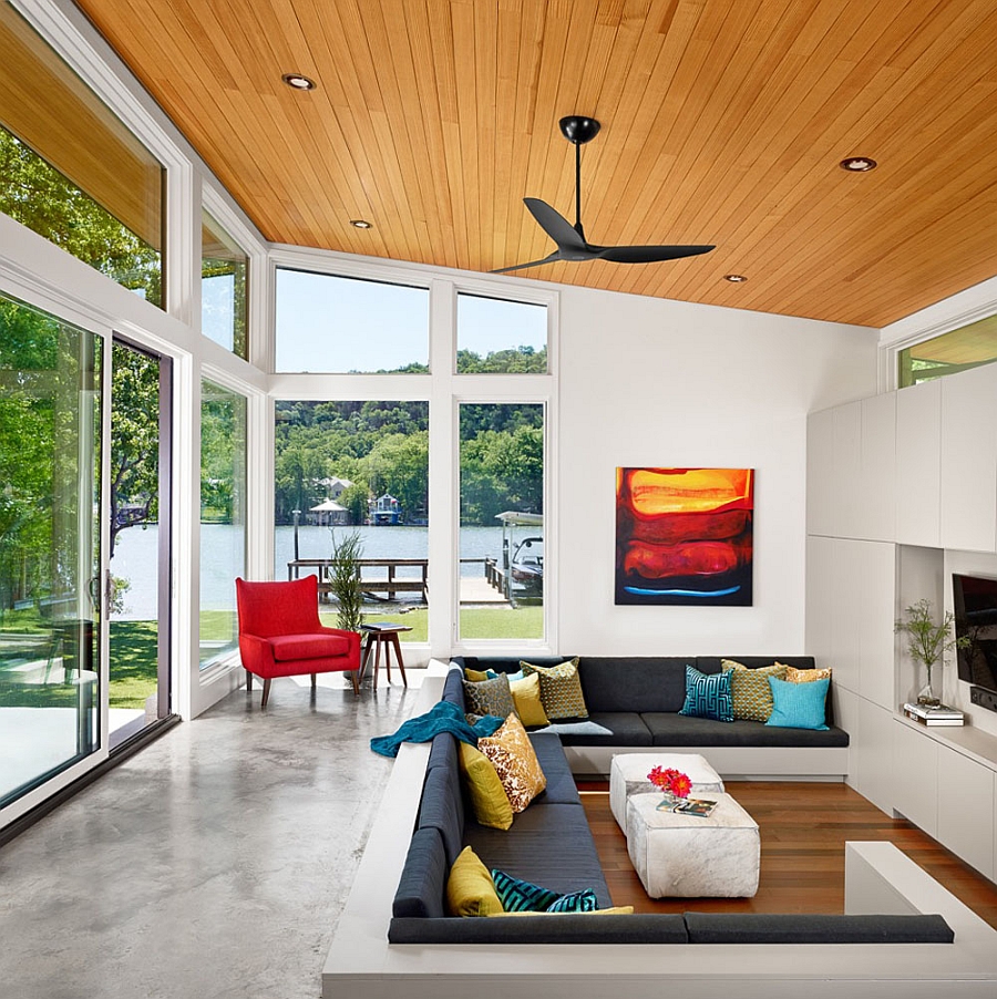 Gorgeous sunken living area and sliding glass walls create a breezy interior