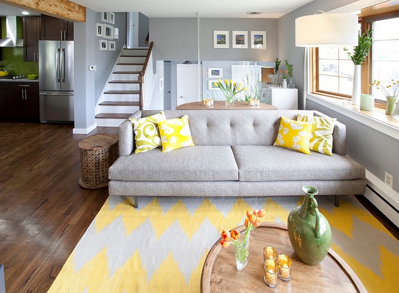 Gray and yellow living room seems both cozy and contemporary