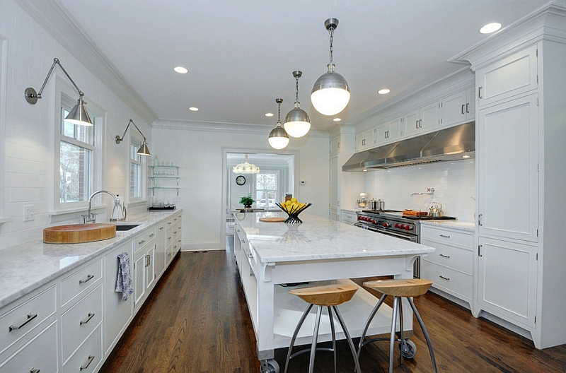 Hicks pendants add a hint of metallic sheen to this transitional kitchen