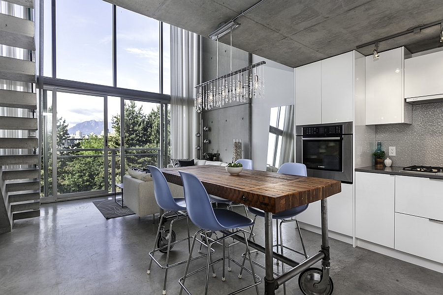 Inventive dining table with wheels can also be used as a mobile serving station!