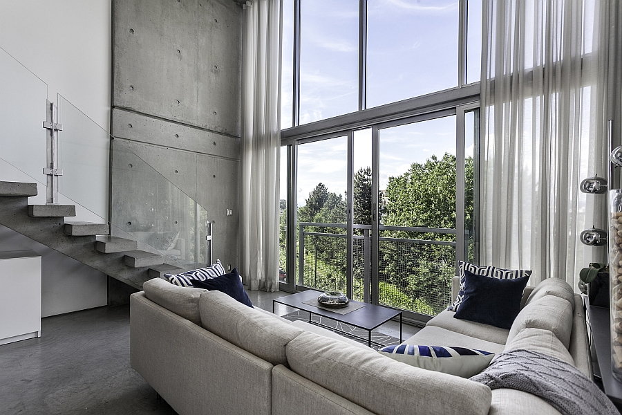 Large glass sliding doors offer unabated city views