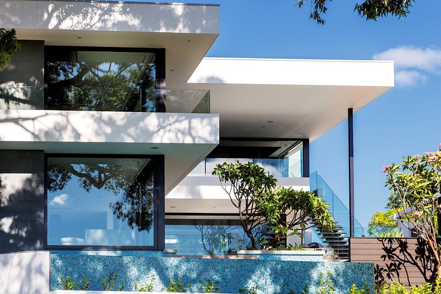 Large glass windows offer sweeping views of the exterior