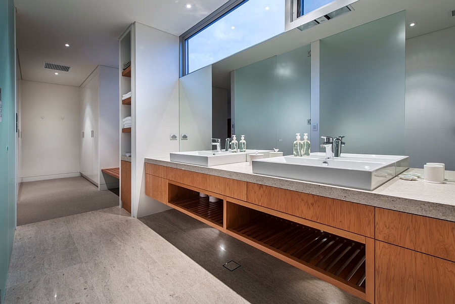 Lavish bathroom with a floating vanity featuring two sinks