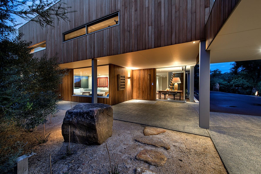 Lovely exterior of the modern beach house draped in wood