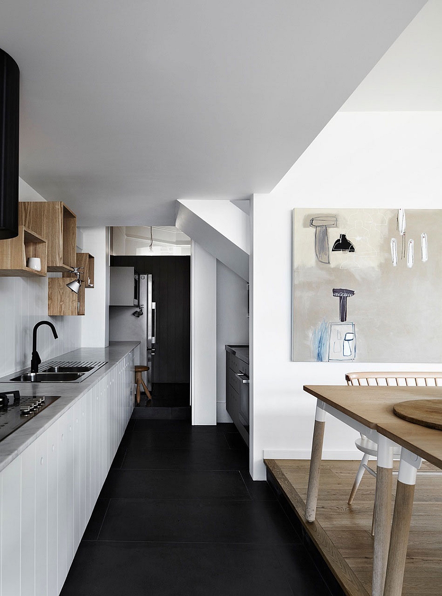 Modern kitchen in white with open wooden shelves and cabinets in white