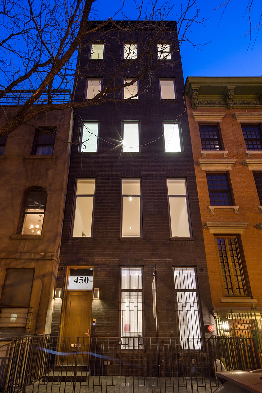 New Front Facade of the NYC Residence with a Solid Oak Door