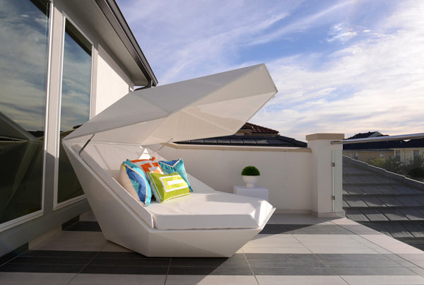 Outdoor lounger with eye-catching pillows