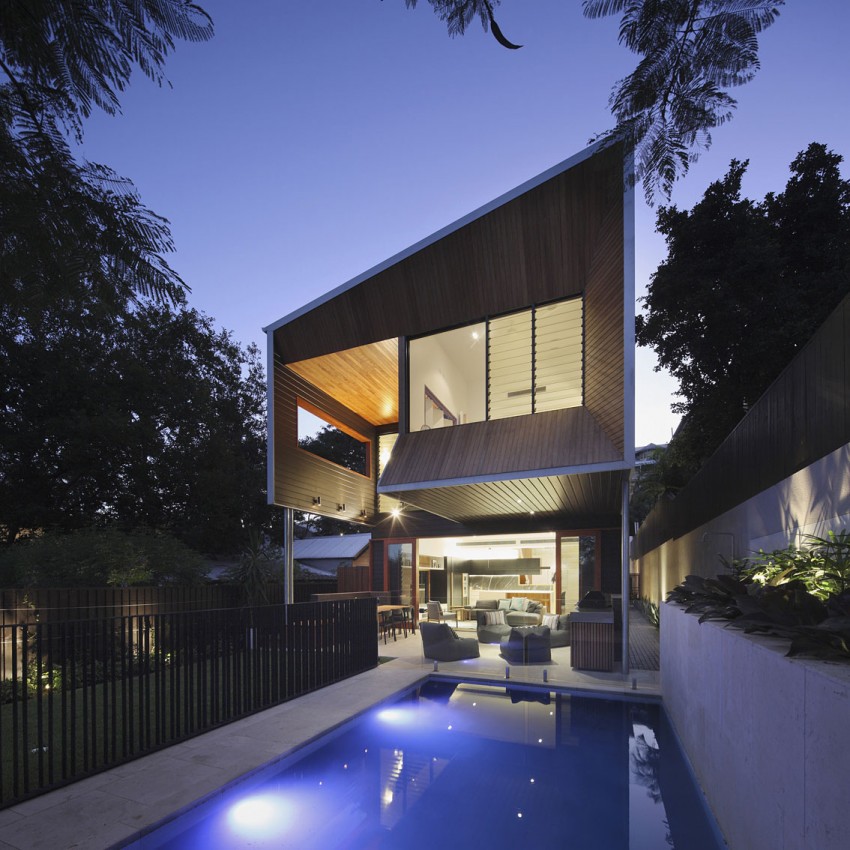 Rear of the Aussie home opens up towards the garden and the pool