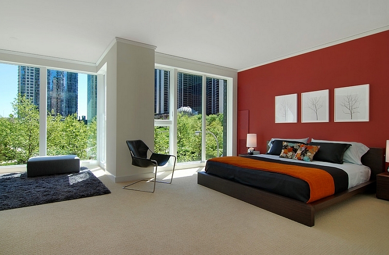 Red accent wall in the bedroom looks classy and elegant