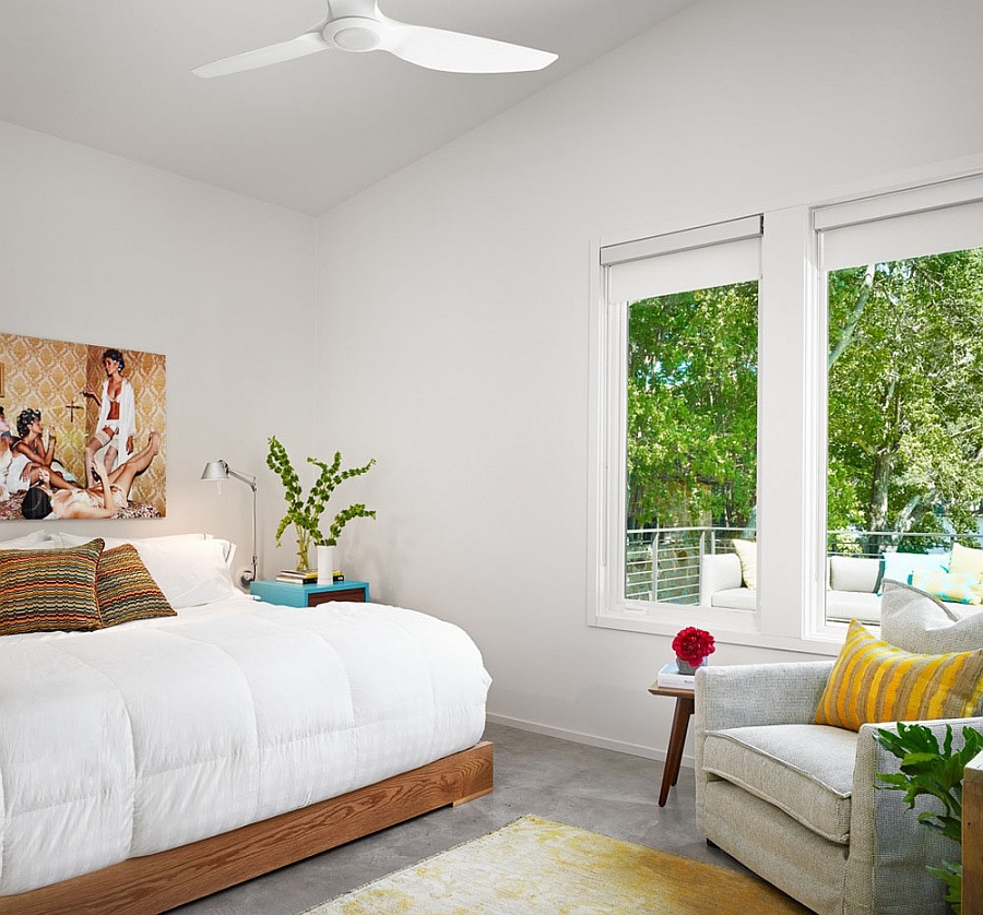 Relaxed bedroom in white with lovely views of the landscape