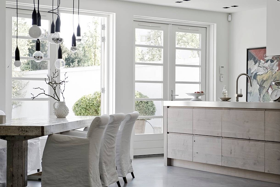 Rustic kitchen in white with a hint of sparkling stainless steel