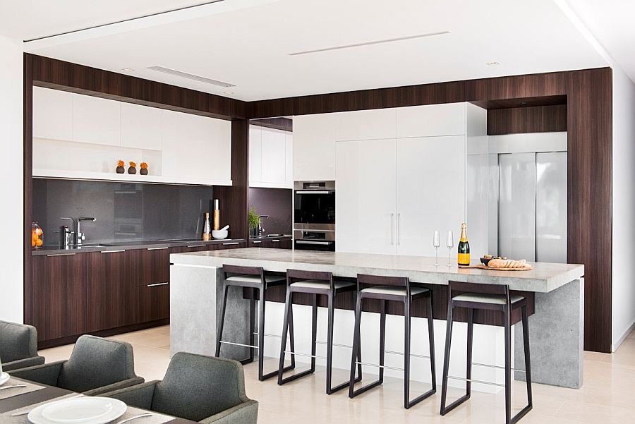 Sleek bar stools add to the contemporary appeal of the kitchen